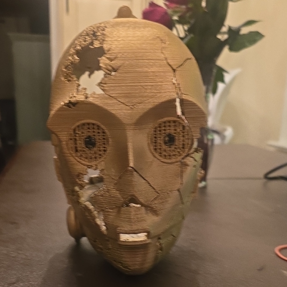 Damaged Cp30 Gold Robotic Face Sculpture
